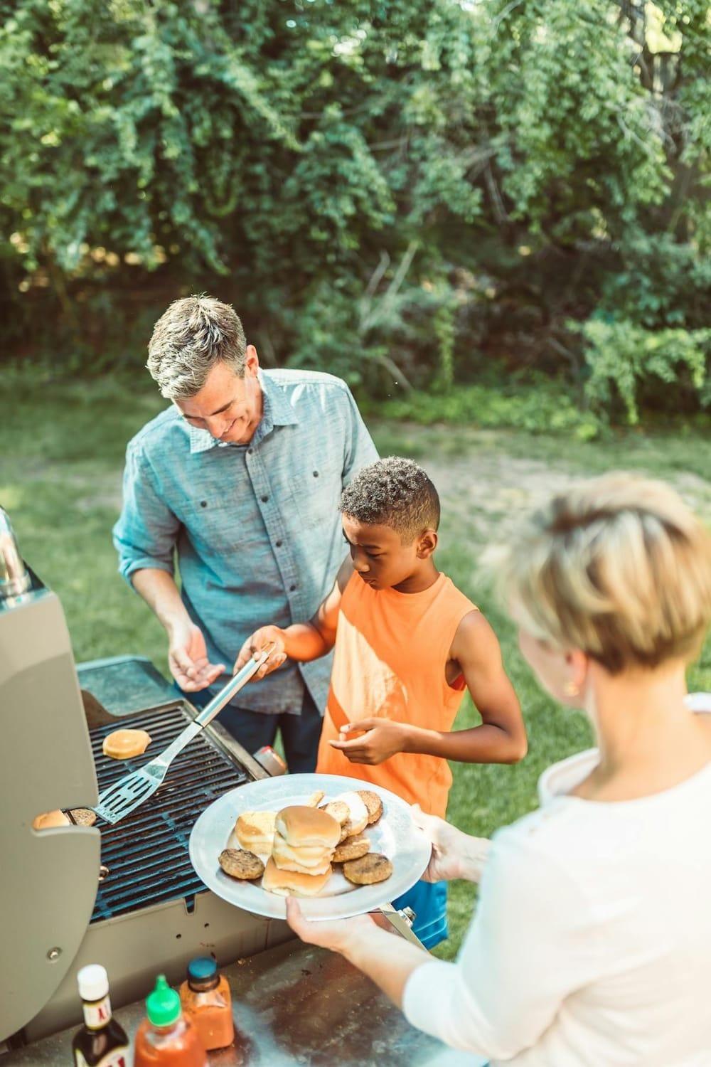 Family BBQ gathering outdoors in Punta Cana