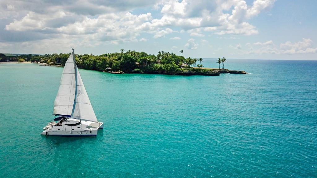 Catamaran sailing in turquoise Punta Cana water